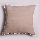 LINEN CUSHION WITH TASSELS.