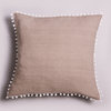 LINEN CUSHION WITH TASSELS.