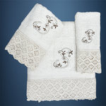 LETTER: S- EMBROIDERED ON TOWELS WITH LACE